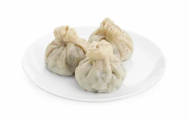 Fotobehang Plate with three tasty khinkali (dumplings) and spices isolated on white. Georgian cuisine © New Africa