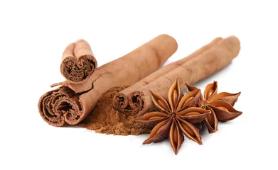 Rolgordijnen Aromatic cinnamon sticks, powder and anise stars on white background, banner design © New Africa