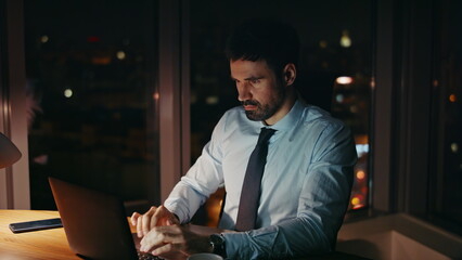 Businessman busy late work sitting office with laptop close up. Manager typing