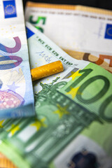 The Cost of Smoking: Euro Banknotes and Cigarette