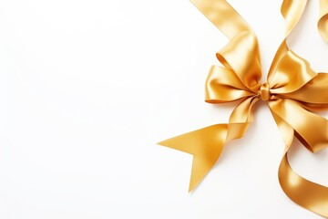 Shiny golden satin ribbon and bow creating a festive atmosphere on a pure white background with ample space for text. Shimmering Golden Gift Bow