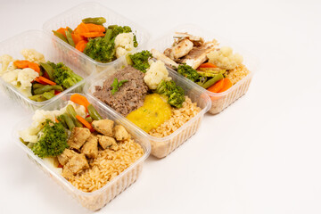 Healthy packed lunch box home prepared meal in front top view clean white background front view