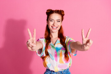 Portrait of positive adorable woman hands touch silky curl wear print shirt show you v-sign say hi...