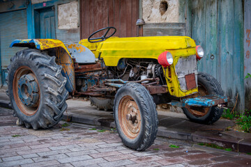 yellow vintage tractor.
