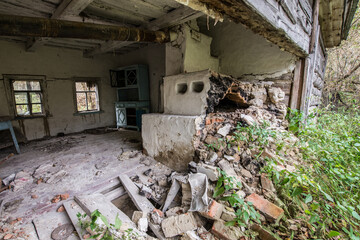 Ruined cottage in abandoned Stechanka village in Chernobyl Exclusion Zone, Ukraine