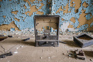 Old measuring instrument in school in Illinci abandoned village in Chernobyl Exclusion Zone