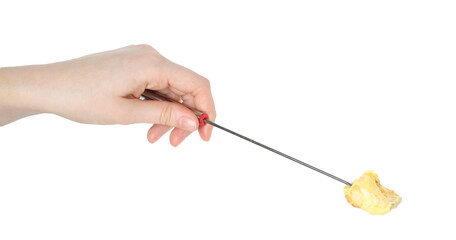 Tasty fondue. Woman holding fork with piece of bread and melted cheese on white background, closeup