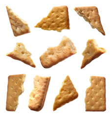 Pieces of delicious crackers isolated on white