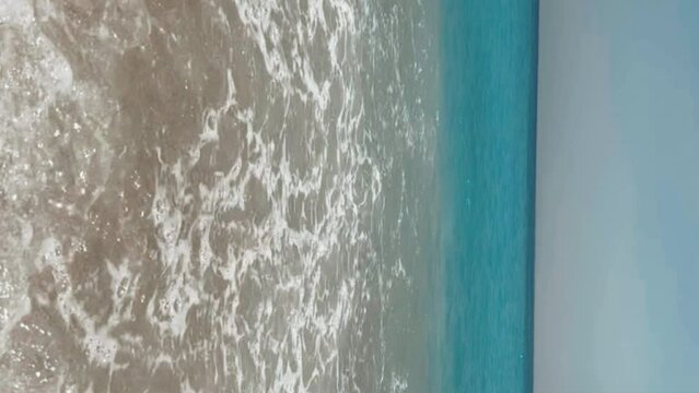 View of the amazing Oludeniz beach and the Blue Lagoon, the best beach in Turkey, Fethiye. Kidrak Beach. Mediterranean bays with blue water. Oludeniz Lagoon. Turkey. 4K