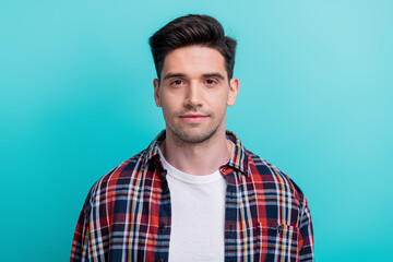 Photo of charming cheerful man dressed plaid shirt smiling isolated turquoise blue color background