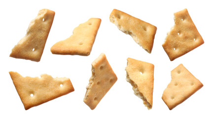 Pieces of delicious crackers isolated on white