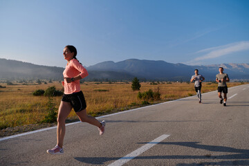 A group of friends maintains a healthy lifestyle by running outdoors on a sunny day, bonding over fitness and enjoying the energizing effects of exercise and nature