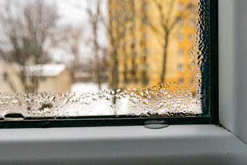 Wet window pane. Water condensation problem.
