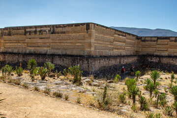 Textured facade of old buildings in the archaeological site of Mitla. 