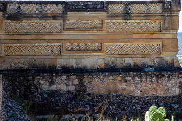Textured facade of old buildings in the archaeological site of Mitla. 