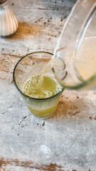 Serving lemonade in a glass