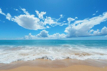 Calm beach, sea and clouds under blue sky.
