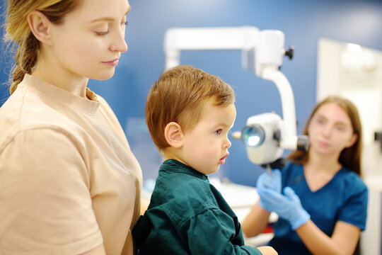 A cute toddler boy with his mother are at an appointment with a pediatric ENT to prepare for preschool.