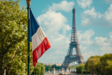 France flag against the background of the Eiffel Tower in blur. free space