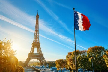French flag and Eiffel Tower on a sunny evening