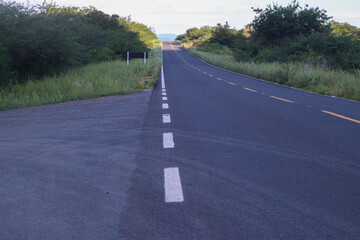 Asphalt with runway entrance and signpost