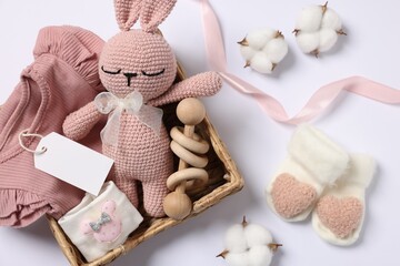 Flat lay composition with different baby accessories on white background