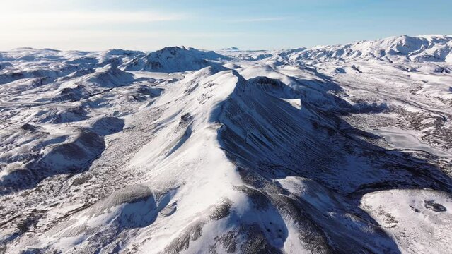 Aerial video over National Iceland Thingvellir in a snowy winter.