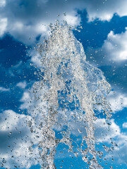 Fountain jets against the sky. day light