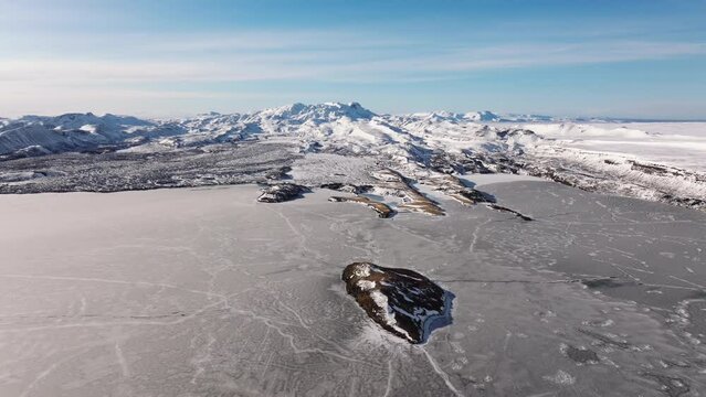 Aerial video over National Iceland Thingvellir in a snowy winter.