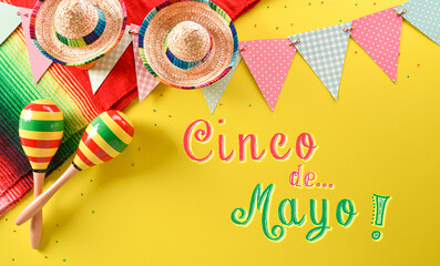 Cinco de Mayo holiday background made from maracas, mexican blanket stripes or poncho serape and hat on yellow background.