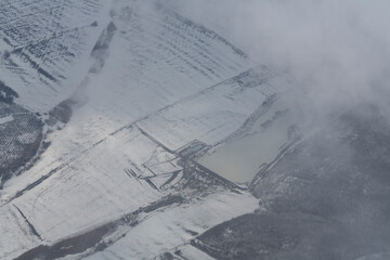 Aerial photography. Europe. Moldova, view from the airplane window. Winter panorama.