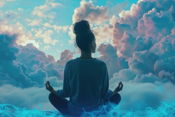 Fototapeta premium Silhouette of meditating person with clouds - Striking silhouette of a person in meditation pose with a surreal backdrop of vibrant clouds, evoking a sense of calm and mindfulness