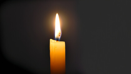Single lit candle with quite flame on a black background horizontal