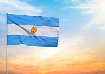 3D illustration of a Argentina flag extended on a flagpole and in the background a beautiful sky with a sunset