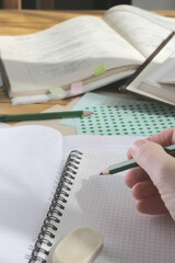 white paper notebook background and pencil, studying concept