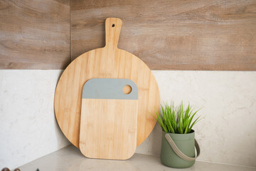 wooden chopping board on a kitchen table 
