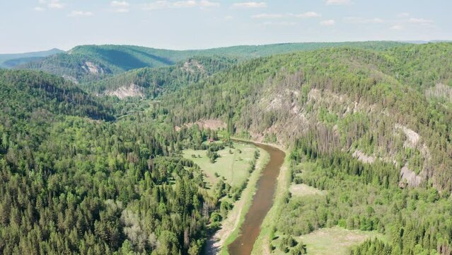 Southern Urals, the Zilim River and the Kuzganak Rock. Aerial view.