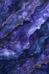 Obraz premium A wallpaper featuring a beautiful blend of purple and blue marbled patterns, creating a striking and elegant visual display