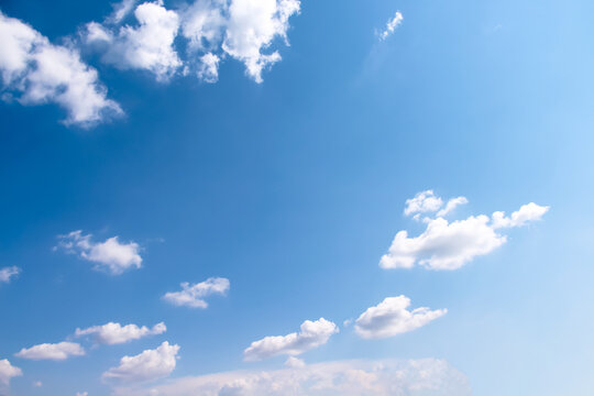 Clouds on blue sky background with light wind