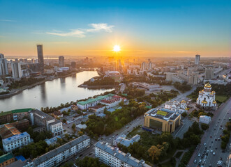 Obraz premium Yekaterinburg city and pond aerial panoramic view at summer sunset. View from Vysotsky skyscraper