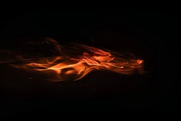 Papier Peint Lavable Feu Fire flames on a black background, an abstract concept of passion and energy