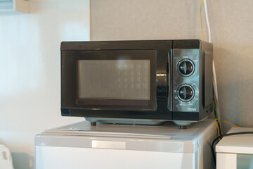 microwave oven in apartment or Home. Kitchenware, dinnerware, lifestyle domestic concept