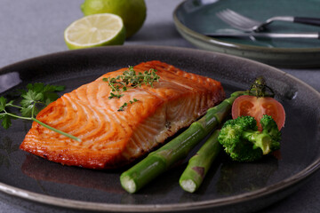 Pan-seared salmon steaks are a delicious and healthy dish. The salmon is cooked to perfection, so the skin is crispy and the flesh is moist.