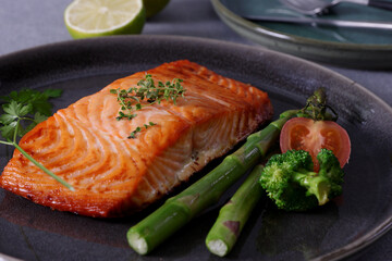 Pan-seared salmon steaks are a delicious and healthy dish. The salmon is cooked to perfection, so the skin is crispy and the flesh is moist.