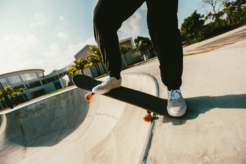 Skateboarder skateboarding at skatepark in city