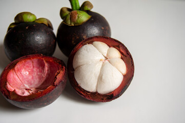 fresh mangosteen fruit on a white background