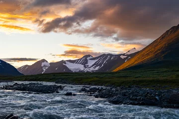 Papier Peint photo Lavable Europe du nord A wild, turbulent mountain river in the Sarek National Park, Sweden. A summer scenery with water in Northern Europe.