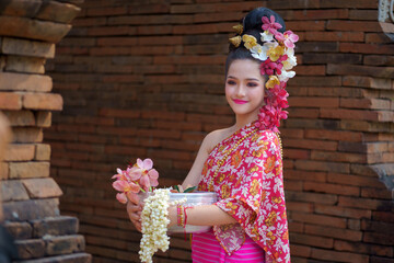Beautiful Thai traditional dress. Pretty Asian women wearing ancient native Northern Thai dress...