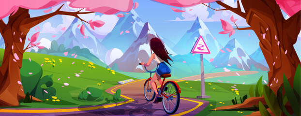 Young woman riding bicycle in mountain park. Vector cartoon illustration of active girl cycling on curvy road with warning sign, pink sakura tree petals flying in air, blue sky, healthy lifestyle - obrazy, fototapety, plakaty