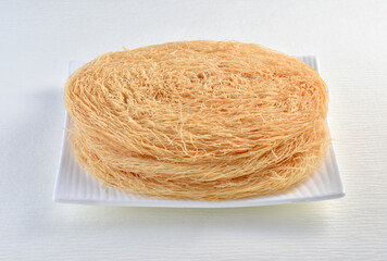 Pheni, Lachha or fried vermicelli is a healthy cereal. It is made by wheat flour and Desi Ghee and...